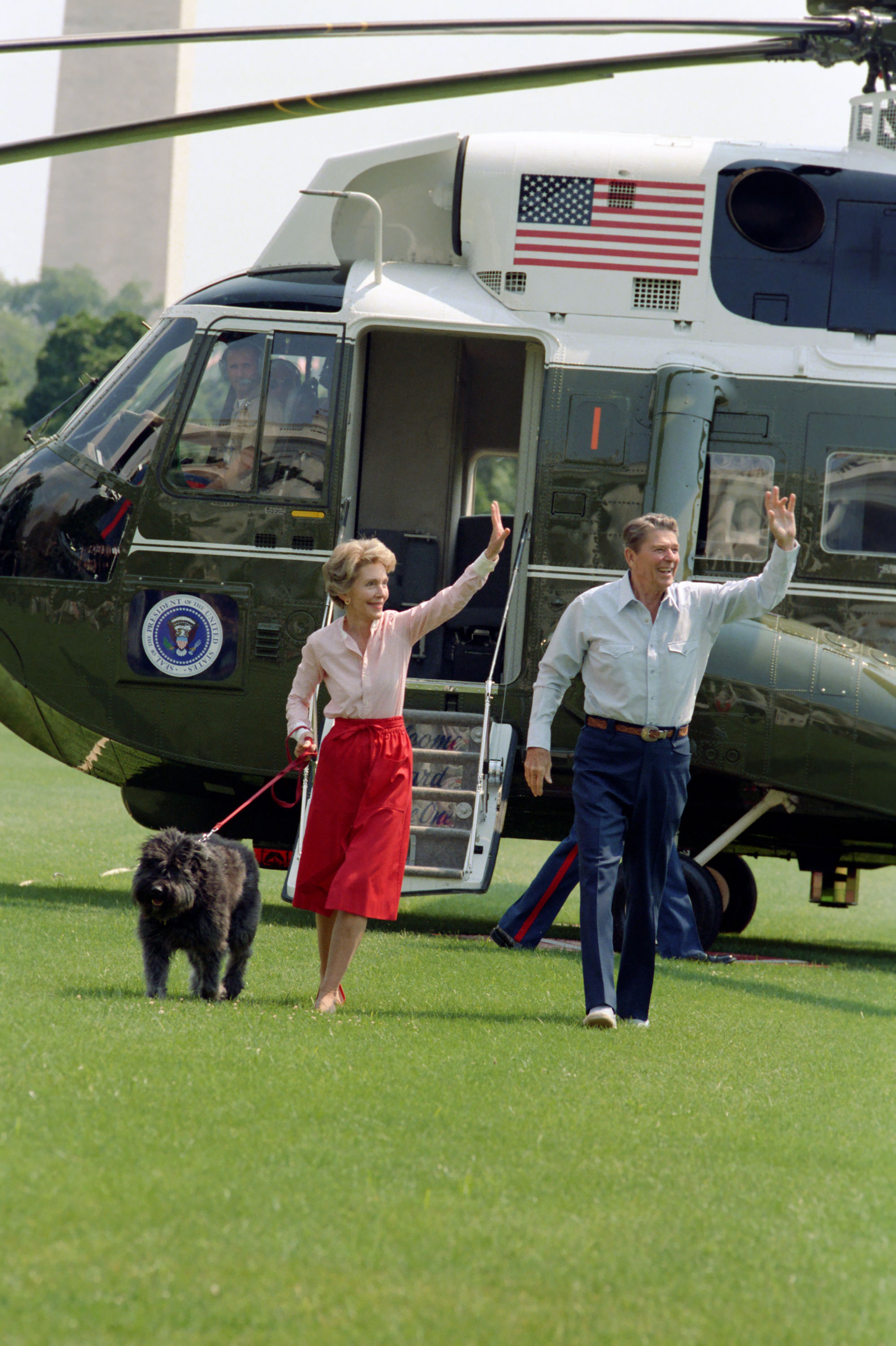 8/4/1985 President Reagan Nancy Reagan and their dog "Lucky" on the South Lawn returning from trip to Camp David via Marine One